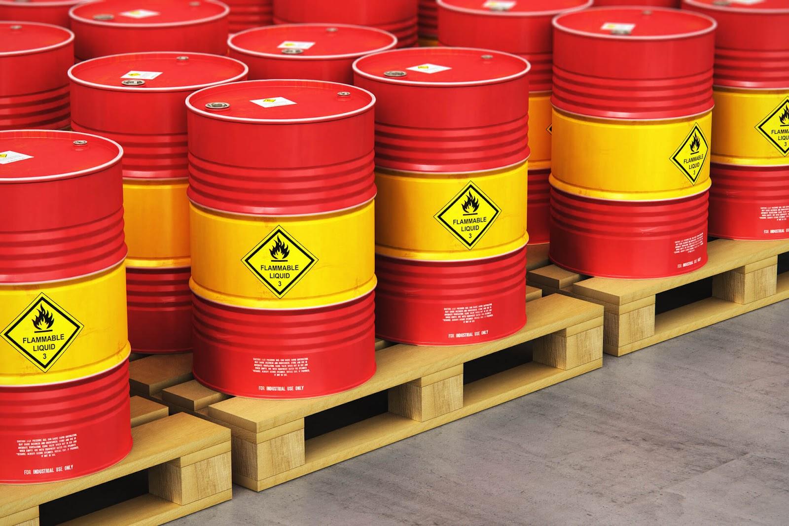 Palletised drums of flammable liquid staged for export