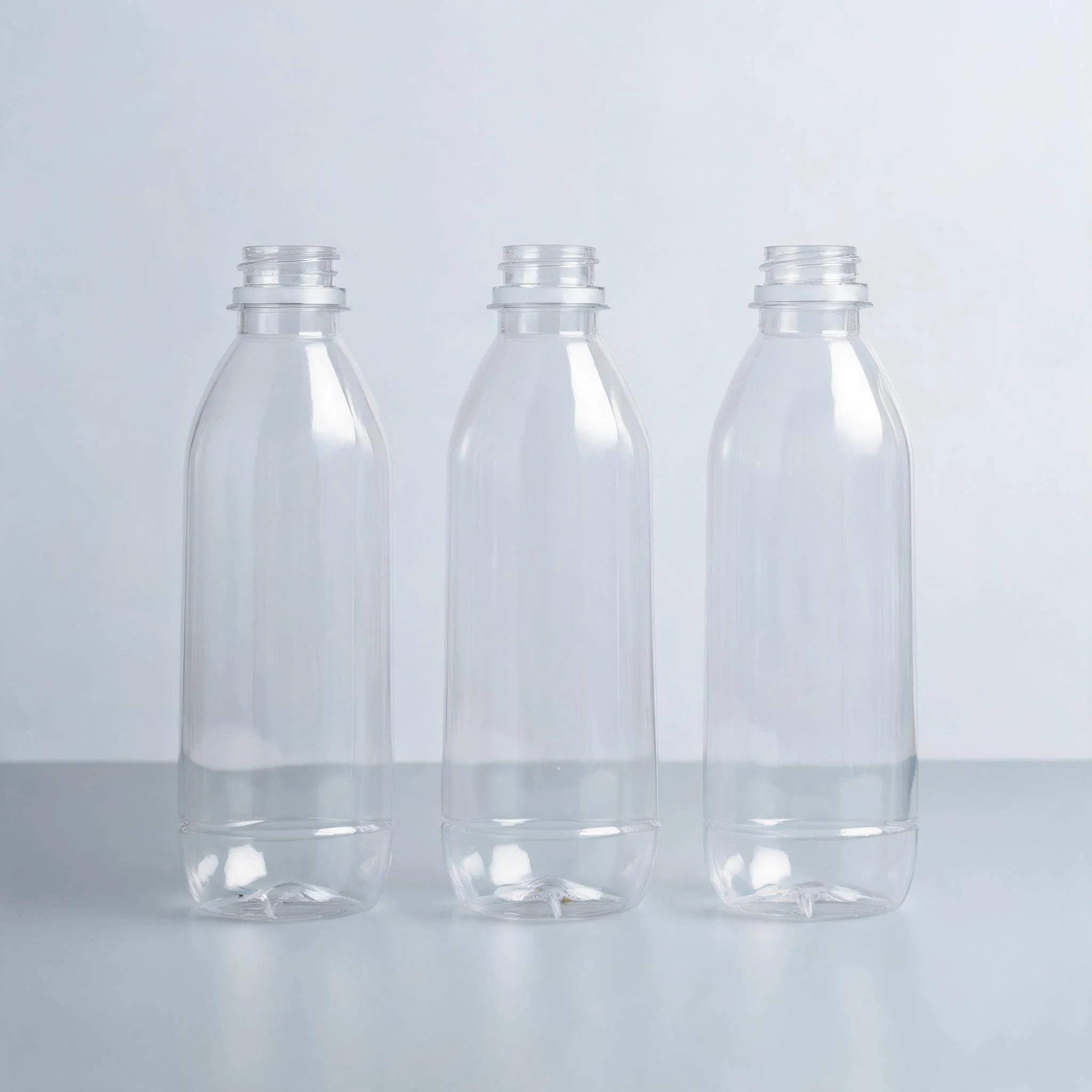 Clear PET bottles made by injection stretch blow moulding